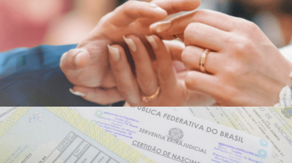 Documentos para Casamiento en España 3 Casal trocando alianças sobre uma mesa com certidões de casamento e nascimento